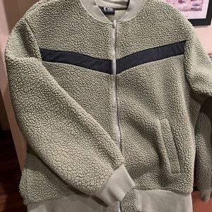 Womens ZYIA Olive Flying V Activewear front zipper.